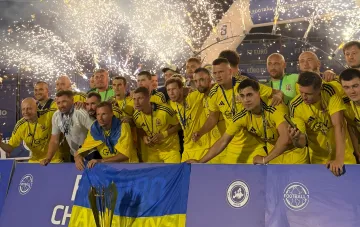 Ukraine national 7x7 football team celebrates historic victory, becoming European champions for the first time, with fireworks and Ukrainian flag