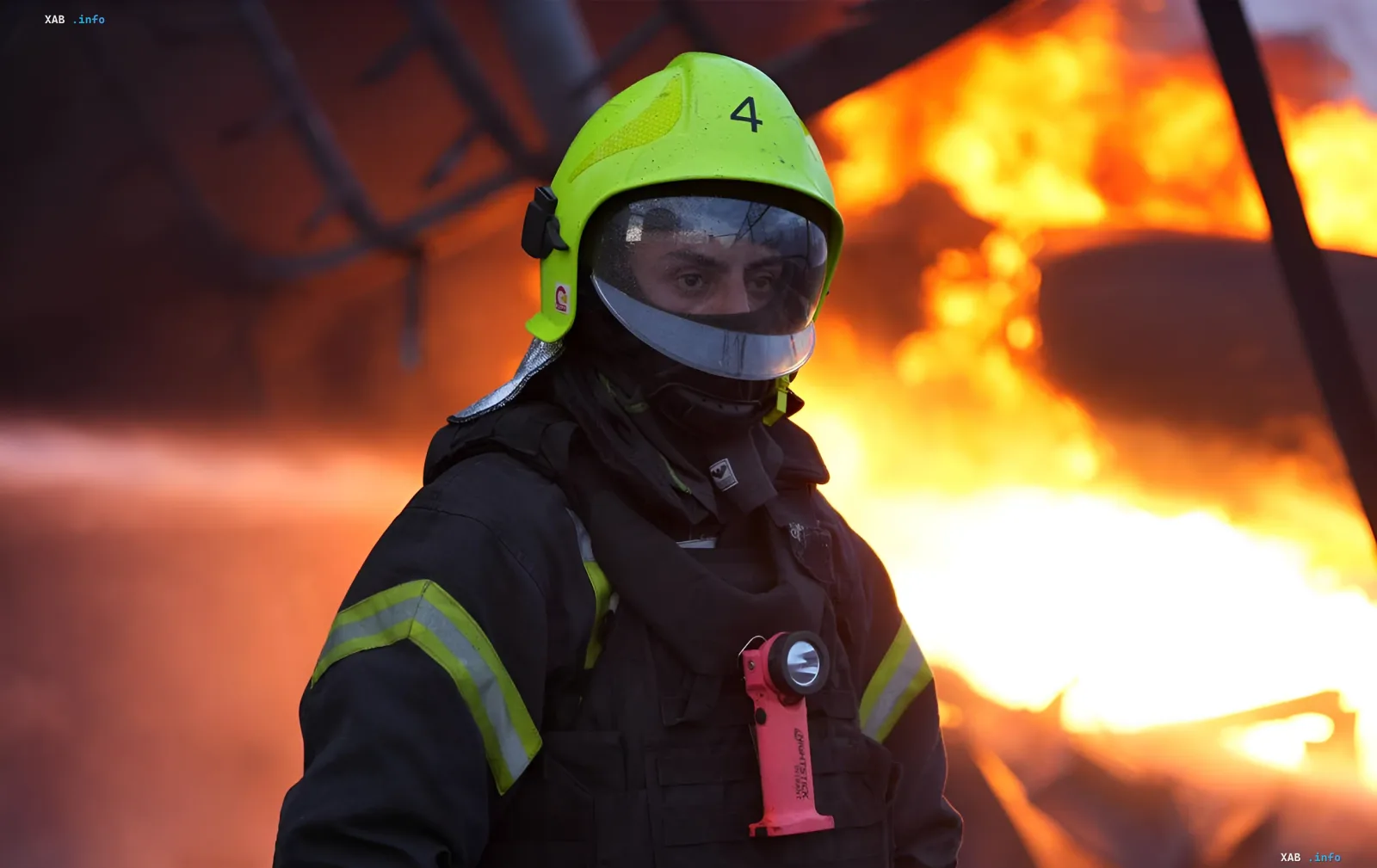 Firefighter in protective gear against flames after KAB strike in Sumy region