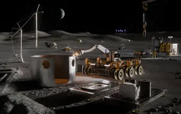 Робот-экскаватор с логотипом NASA сваривает металлическую конструкцию на поверхности Луны, подготавливая базу для будущих миссий