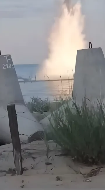 Explosion of an explosive device in the sea near Hrybivka village, Odesa region: column of fire and smoke over water