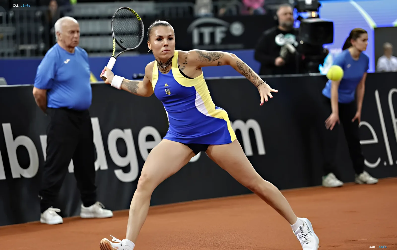 Alexandra Olenikova in action on the tennis court, demonstrating strength and determination despite WTA blocking her charity auction