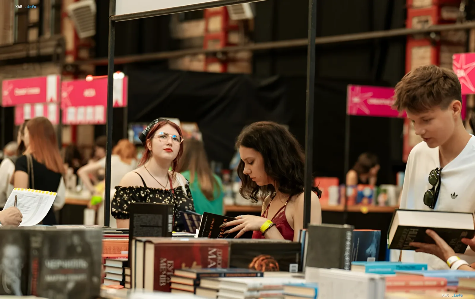 Visitors at BestsellerFest 2026 in Lviv browsing books at a book stand