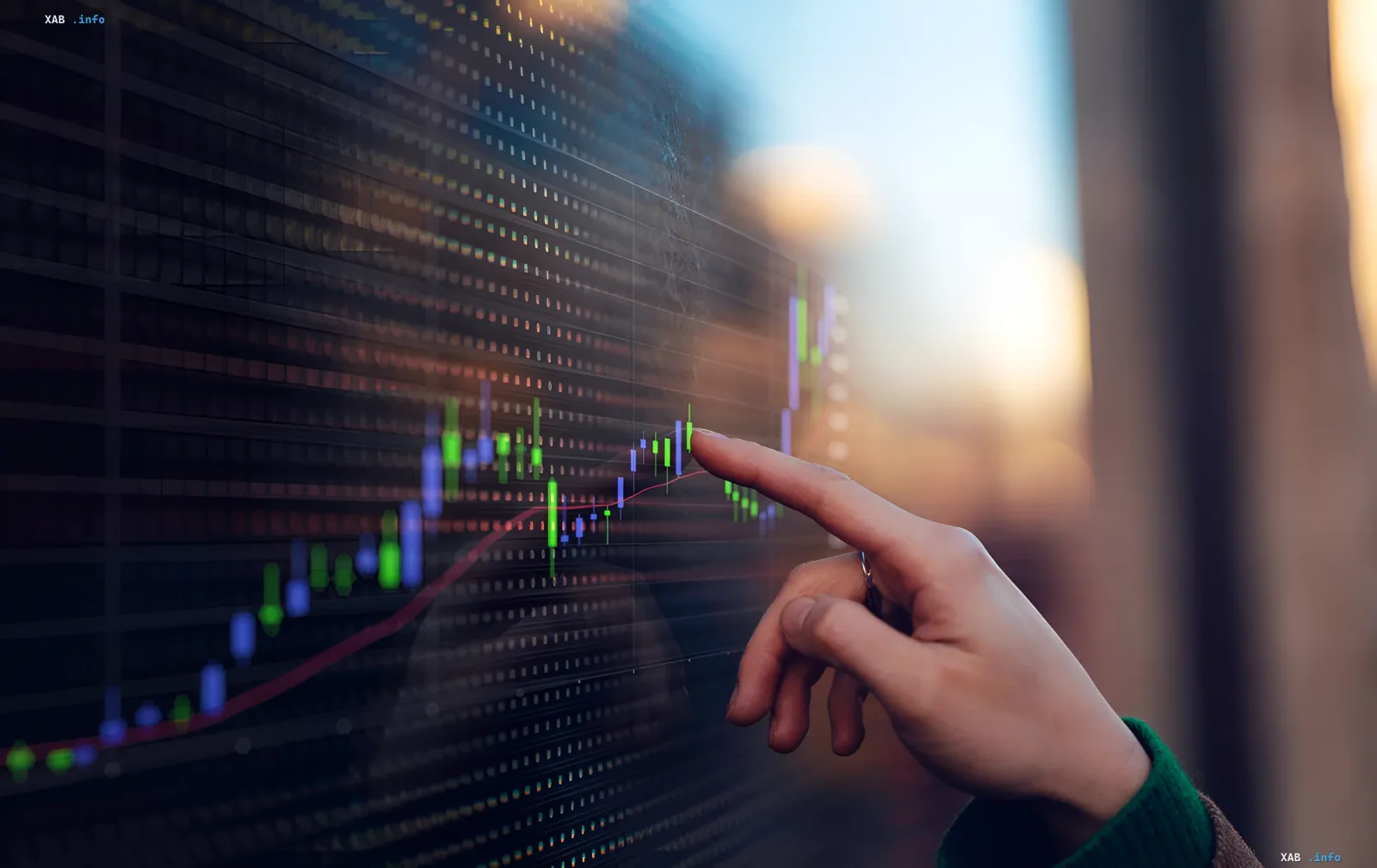 Analyst points to a financial chart, symbolizing Ukraine's budget dependency on external grants in 2026