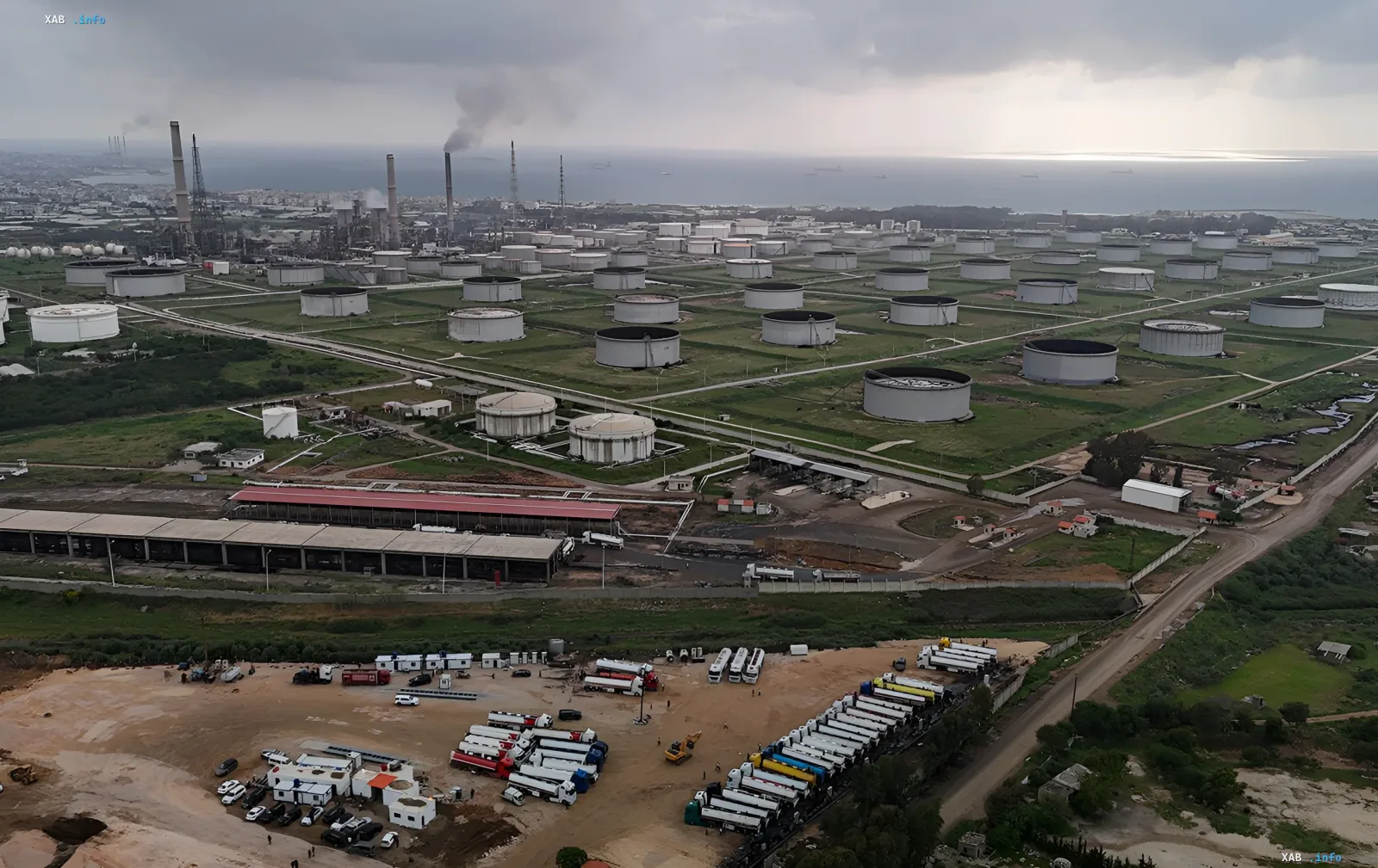 Oil storage tanks and industrial zone symbolizing the role of oil in Damascus negotiations with the US for sanction relief