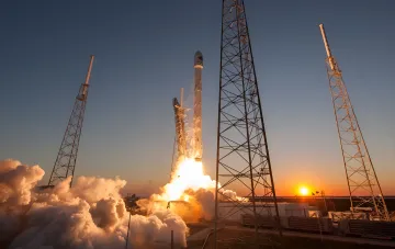 Falcon 9 launch with secret satellite NROL-95 at sunset, 7th flight of this booster