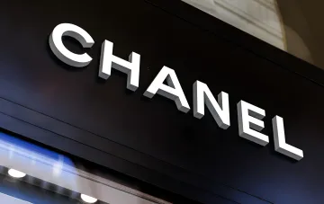 Chanel logo on boutique facade, symbolizing brand leadership in Lyst Index Q2 2026 ranking