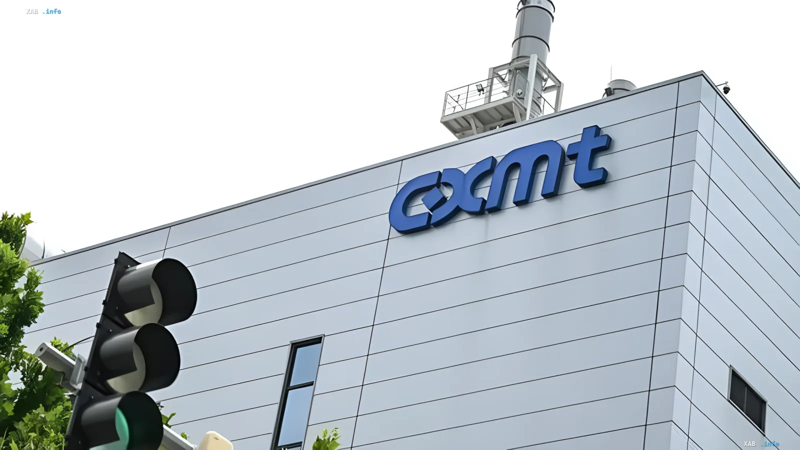 Factory building of Chinese company CXMT with logo on facade, producing DRAM memory impacting global laptop supply chains