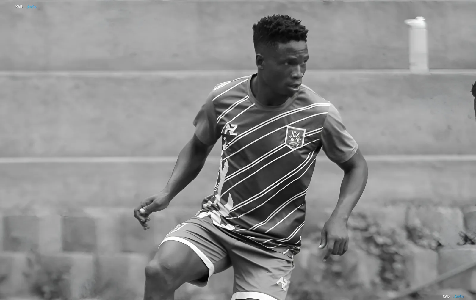 David Owori, captain of SC Villa football club, in action on the field