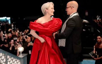 Meryl Streep in a red dress on the red carpet, costume from 'The Devil Wears Prada 2' at auction