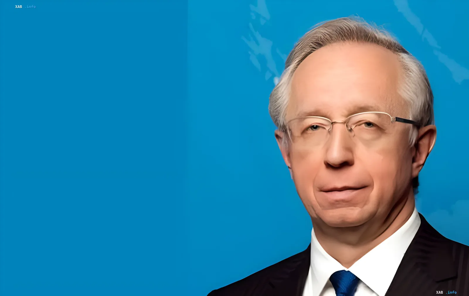 Mikhail Umnov, Russian Foreign Ministry spokesperson, against blue logo background — illustration for article on Moscow’s rejection of ‘freeze’ compromise and demand for Western reaction to Ukrainian strikes