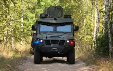 Бронеавтомобиль Tisa для РХБ-разведки Нацгвардии Украины на лесной дороге