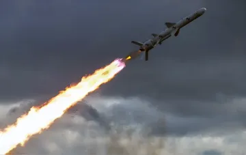 Rocket in flight with fiery trail, illustrating increased missile strikes by Russia on Ukraine