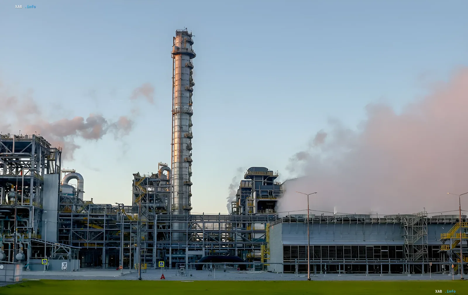 ZapSibNeftekhim petrochemical complex with smoke from chimneys after drone attack, production halted