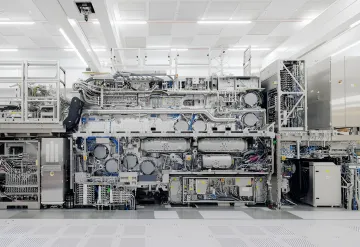 Complex industrial chip manufacturing setup symbolizing TSMC's revenue growth driven by AI infrastructure investments