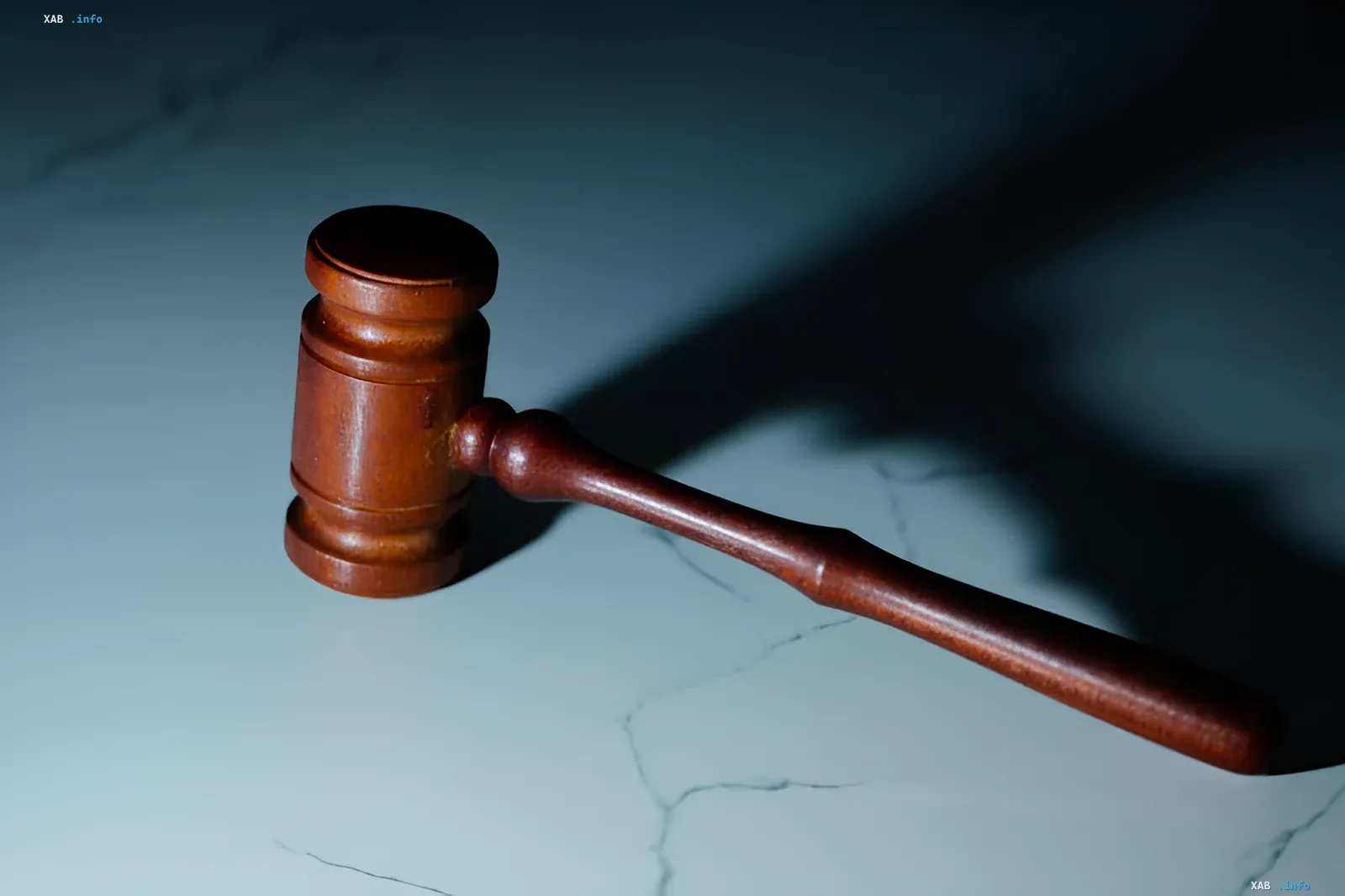 Judge’s gavel on marble table — symbol of court ruling on lawsuits against Meta, Google, and TikTok over teen digital addiction