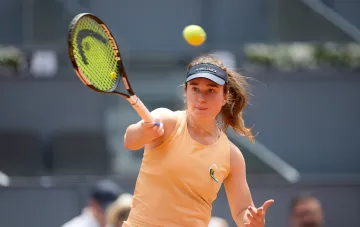 Марта Костюк в действии на корте во время матча WTA 1000 в Цинциннати