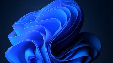 Abstraktes Bild von blauen Wellen, die Windows symbolisieren, im Kontext der Erhöhung der Lizenzkosten für Hersteller