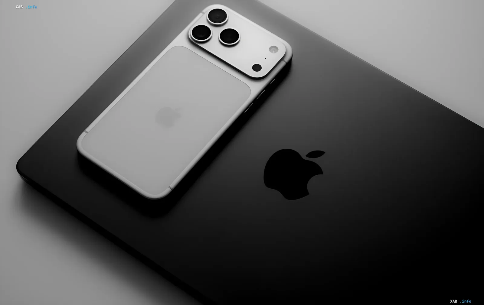 Концепт белого iPhone 18 с тремя камерами на черном MacBook, иллюстрирующий возможный дизайн базовой модели Apple в 2027 году
