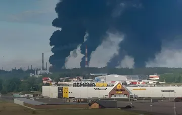 Huge black smoke rises above a Russian oil refinery after Ukrainian drone attacks, causing a fuel crisis before elections