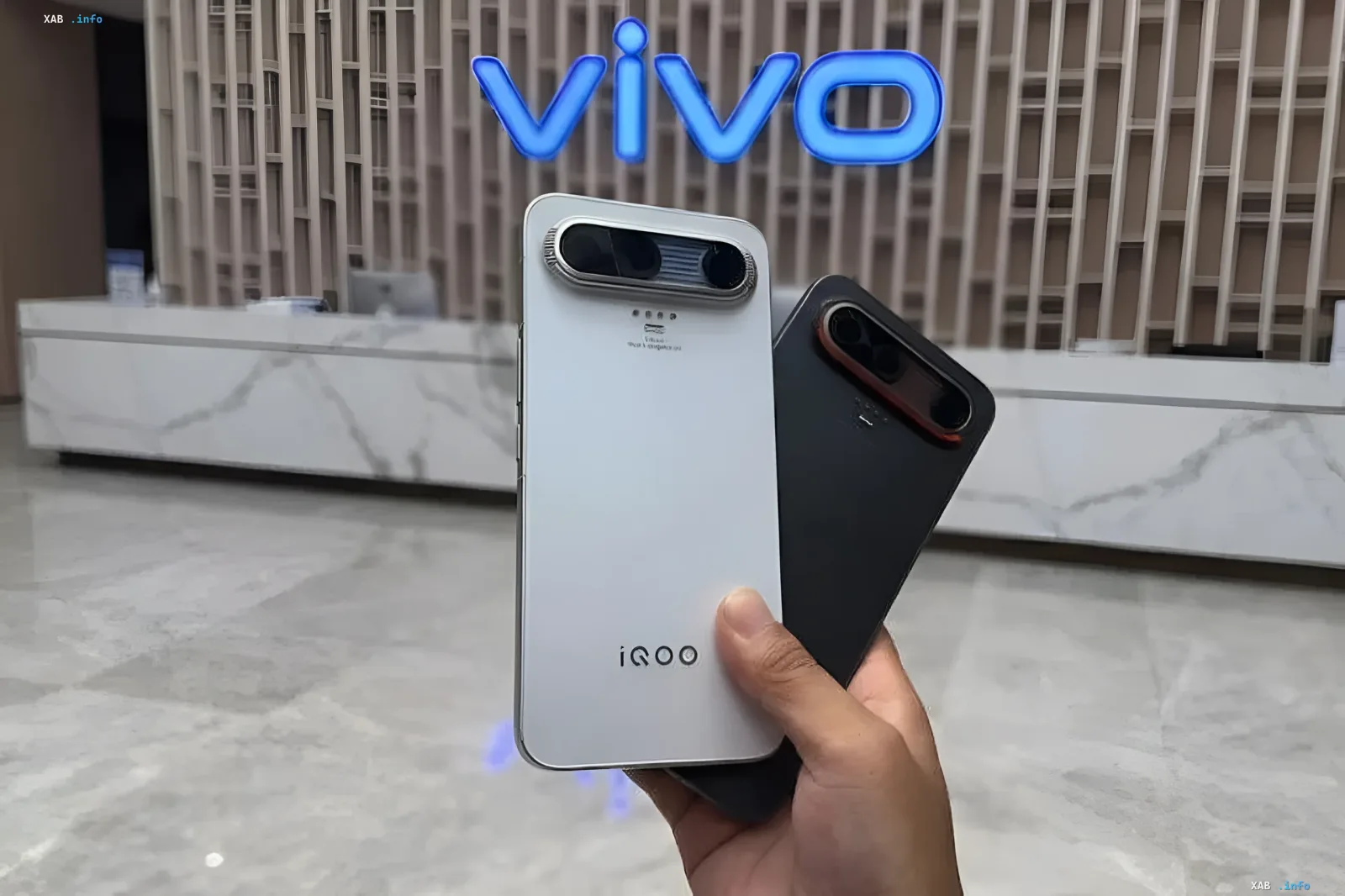 iQOO X concept smartphone in white and black with a unique camera module against the vivo logo background