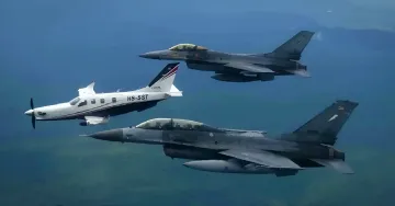 Thai Prime Minister Anutin Charnvirakul in personal aircraft HS-SST escorted by two F-16 fighter jets during military exercises