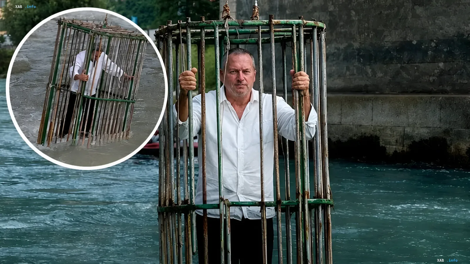 Politician in a white shirt stands in a metal cage submerged in a river in Trento as part of a symbolic punishment for poor performance