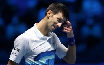 Novak Djokovic during his withdrawal from the Cincinnati match due to heat, expressing disappointment