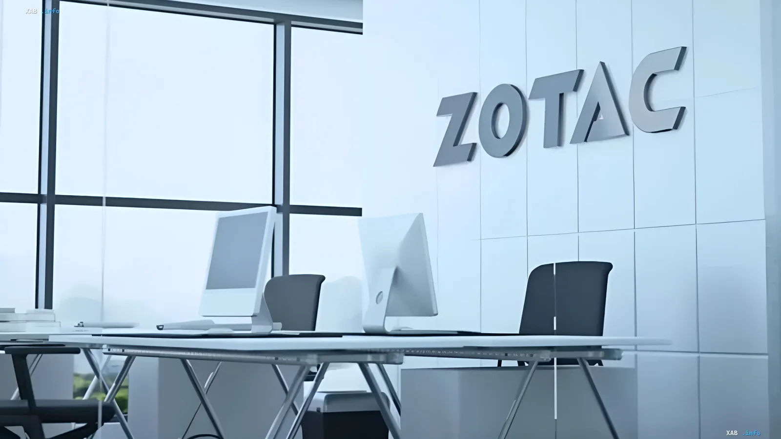 Офіс ZOTAC з логотипом на стіні та робочими місцями, що ілюструє попередження PC Partner про дефіцит бюджетних відеокарт у 2026 році