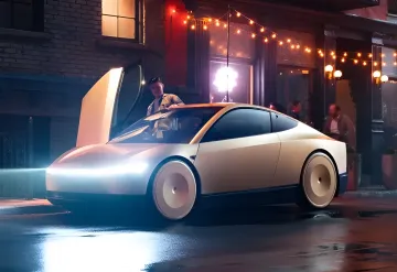 Белый прототип Tesla Cybercab с открытыми дверями-крыльями в ночном городе, иллюстрирующий запуск беспилотного такси