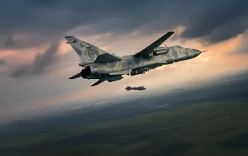 Су-25 ВВС Украины сбрасывает корректируемую авиационную бомбу (КАБ) на фоне заката, иллюстрируя эволюцию тактики применения авиации в 2026 году.