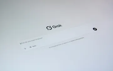 Grok chatbot interface with input field and logo, illustrating the vulnerability that lets hackers hijack chat history via encrypted instructions