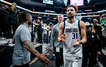 Klay Thompson in a Dallas Mavericks jersey number 31 walks onto the court before his move to the Miami Heat after a contract buyout