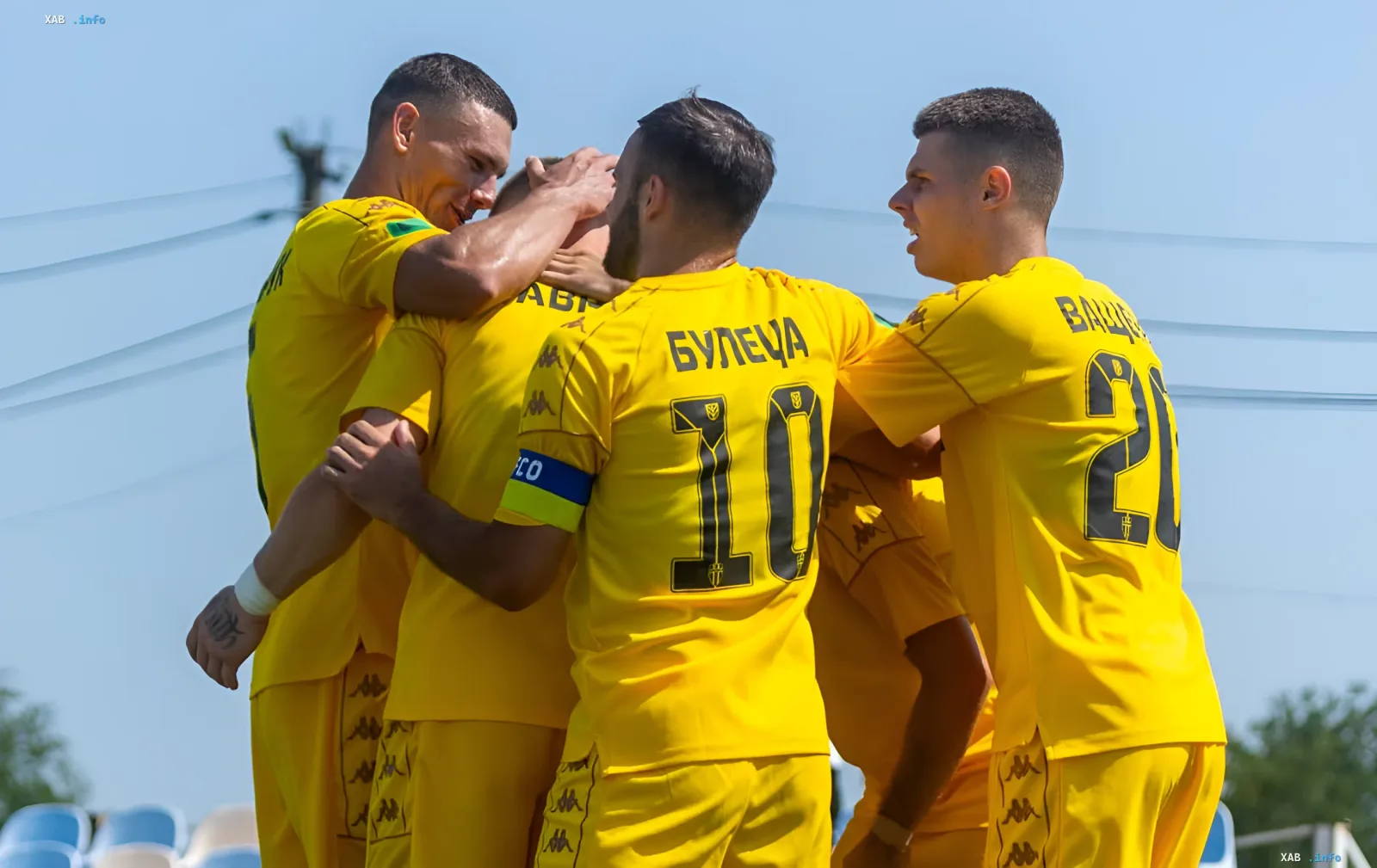 Football players in yellow kits celebrating a goal during the 2026/27 Ukrainian Cup round of 32