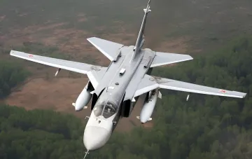 Russian Su-24M front-line bomber in flight — the type of aircraft destroyed by a long-range strike at Saki airbase in Crimea