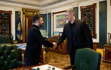 Volodymyr Zelensky and Mykhailo Fedorov shake hands during a meeting on the 'ministry of war' intrigues