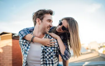 Happy couple at sunset: illustration of love at first sight across the zodiac signs