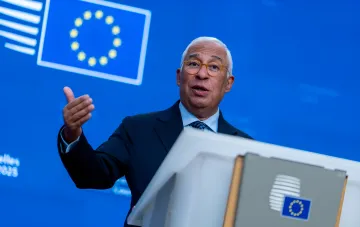 António Costa speaks at a podium bearing the EU flag during his capital tour to align positions on the budget, defence and Ukraine support