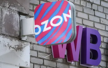 Ozon logo on a building sign — marketplace hid 56 warehouse addresses ahead of Ukrainian strikes on logistics