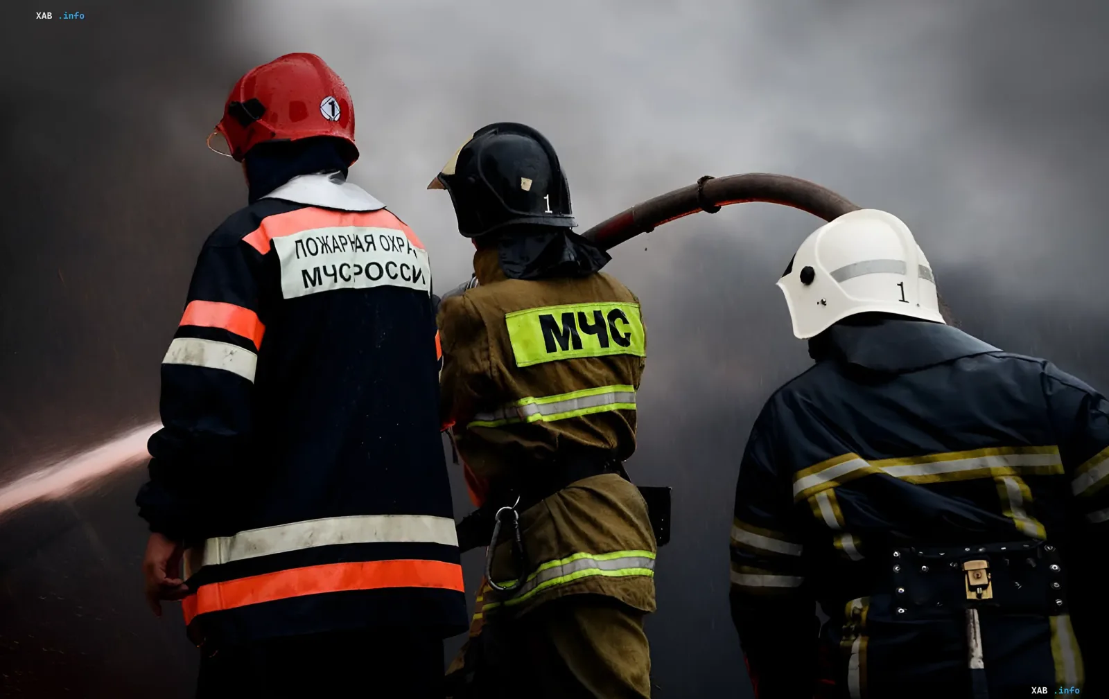 Russian EMERCOM (MChS) rescue workers in protective gear at the fire scene of the struck Ozon logistics hub in Dagestan