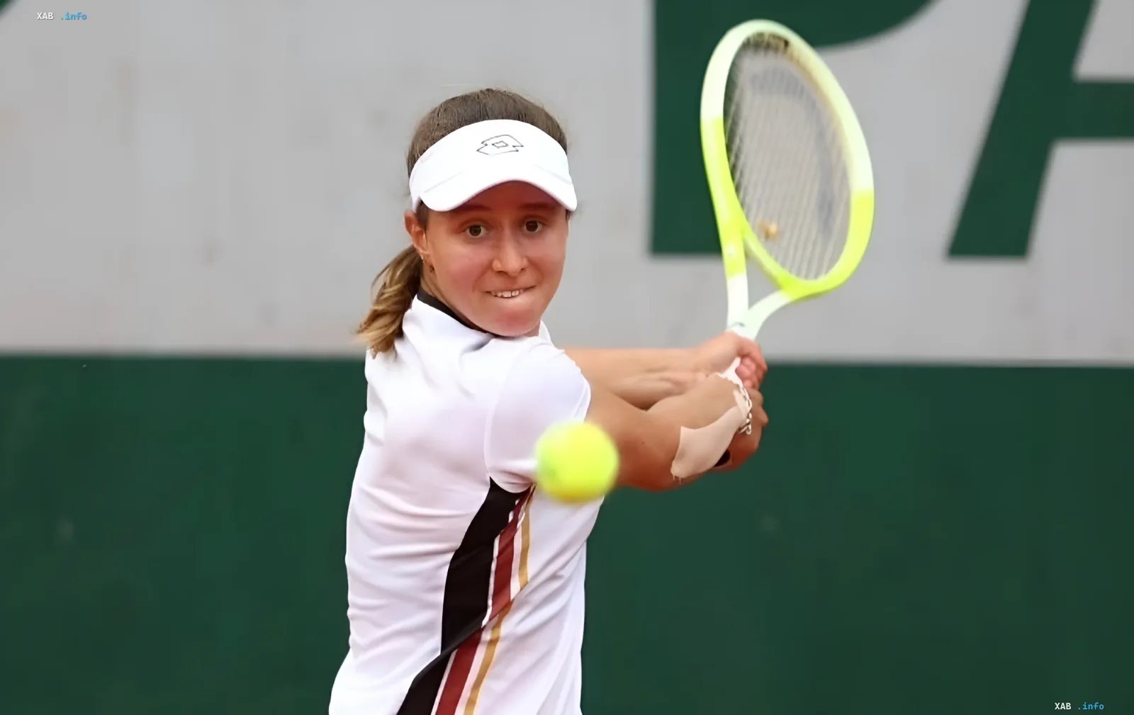 Veronika Podrez in action on court: hitting the ball in a US Open-2026 qualifying match