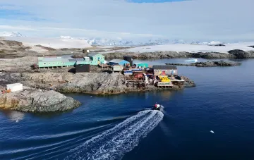Antarctic research station and vessel in an icy harbor: context for the record selection of the 32nd Ukrainian Antarctic expedition, with women submitting half the applications