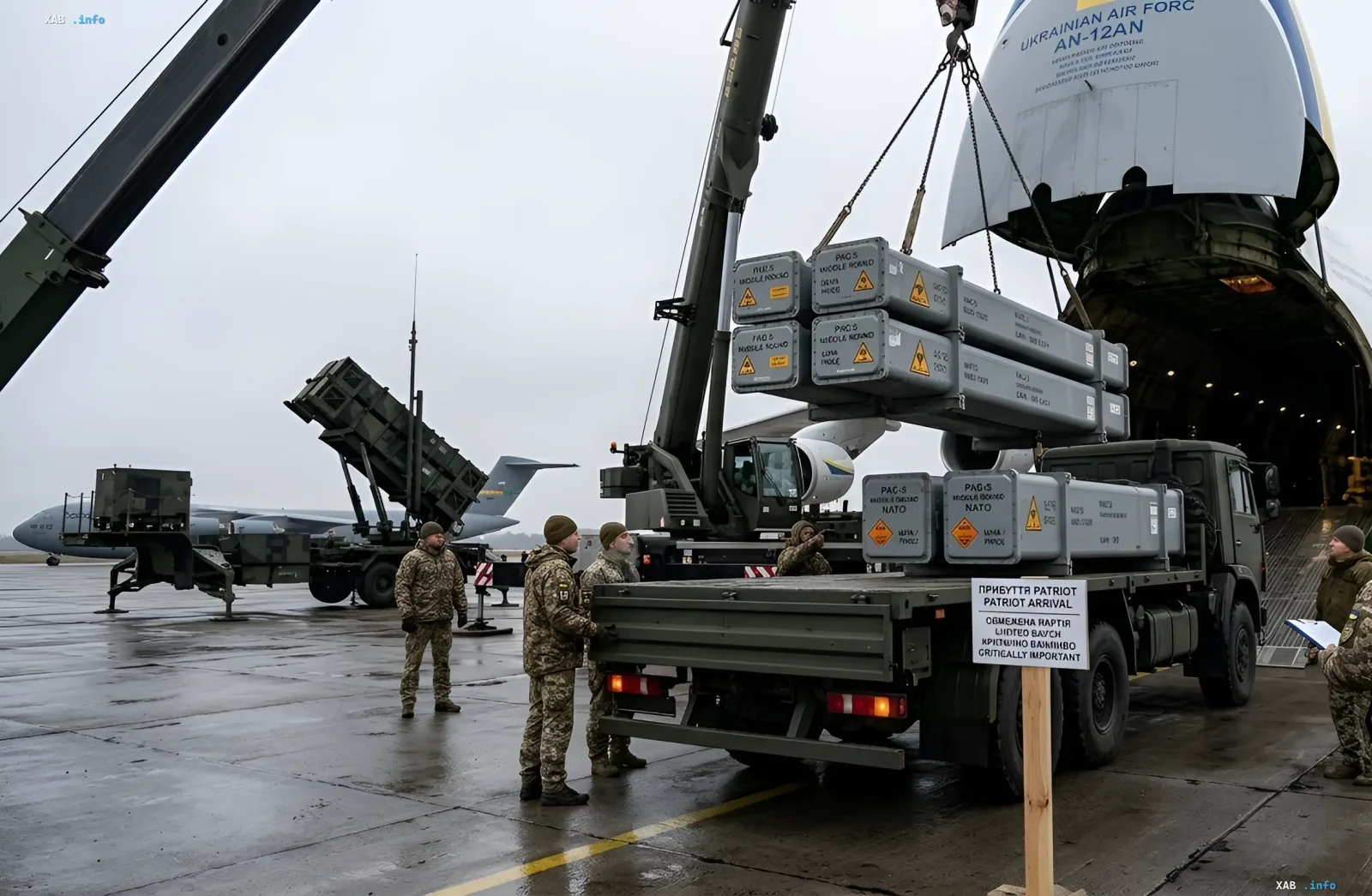 Unloading Patriot air-defense missiles from a Ukrainian Air Force AN-12AN aircraft at an airbase