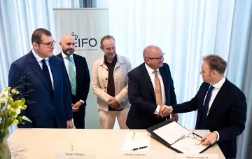 Unterschreibungszeremonie der 100-Millionen-Euro-Finanzierungsvereinbarung von EIFO für ein 94,5-MW-Windkraftwerk von Kernel