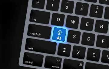 Glowing blue AI key with a robot icon on a keyboard — symbol of the automated bot farm behind ChatGPT