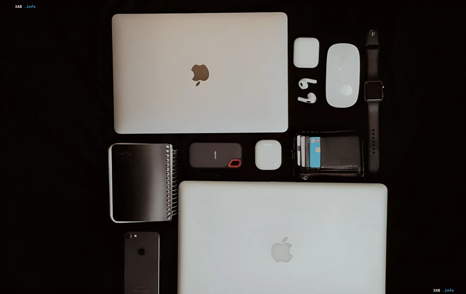 Apple device ecosystem: MacBook, iPad, iPhone, AirPods and Apple Watch on a black background ahead of the September 9 «Surprise and shine» event featuring the foldable iPhone Ultra