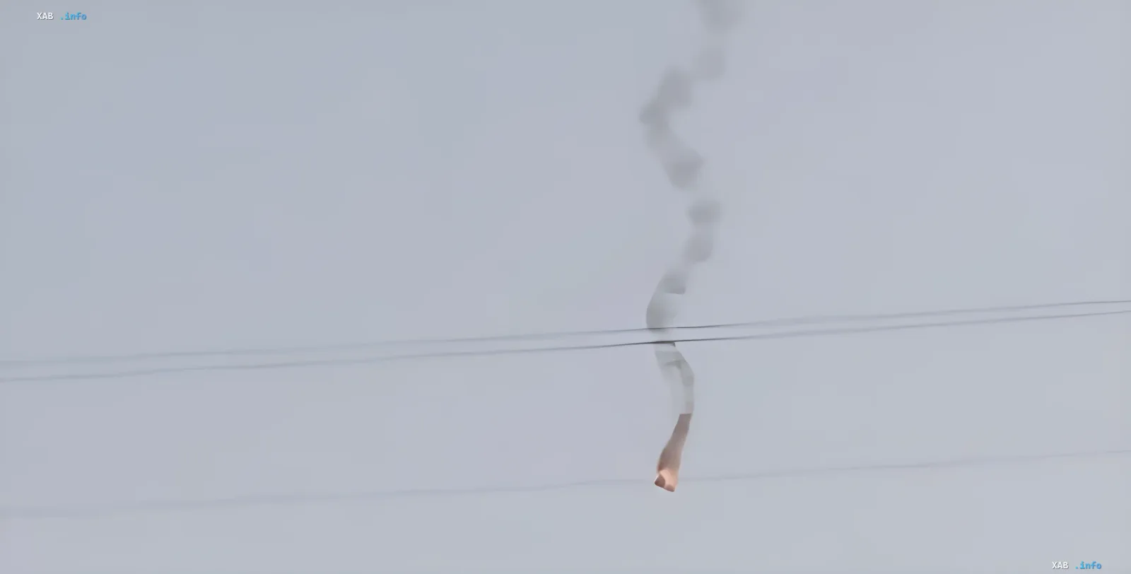Trail of a jet-powered drone in the sky over Dynamo Stadium in Kyiv