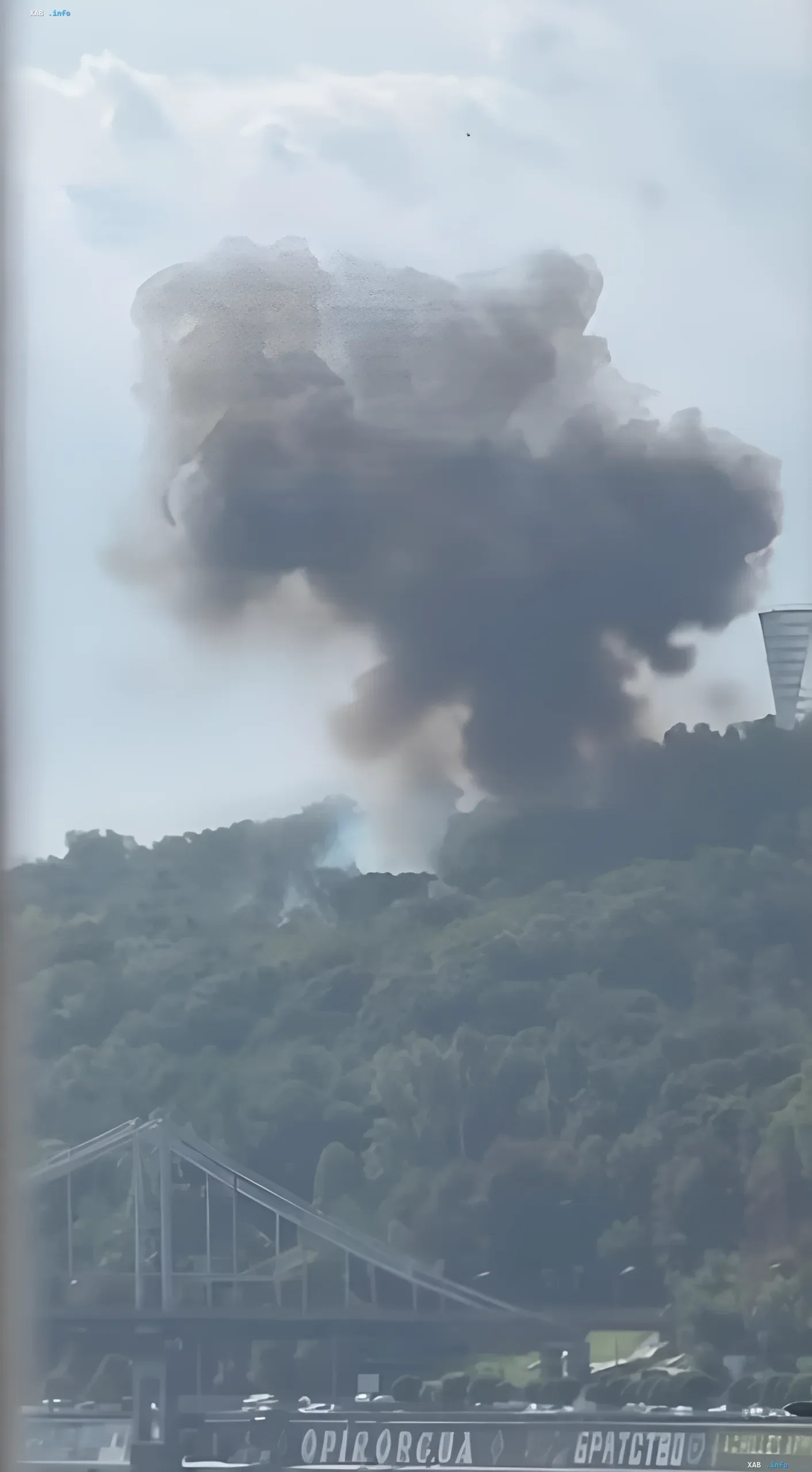 Smoke plume over the forest in Kyiv A massive plume of black smoke rising over a wooded hill near the Dynamo Stadium in Kyiv after a drone attack