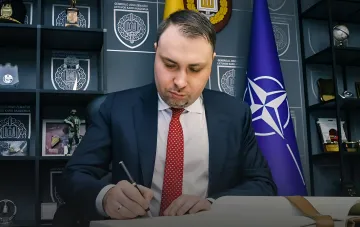 Budanov signs a document in an office with a NATO flag: war with Russia to last through winter 2026–2027