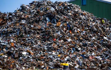 Mountain of scrap metal at a recycling yard: Ukraine's scrap market and WTO quota protection