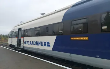 Ukrzaliznytsia train on the Lviv–Warsaw route standing at the platform amid reports of delays caused by attacks